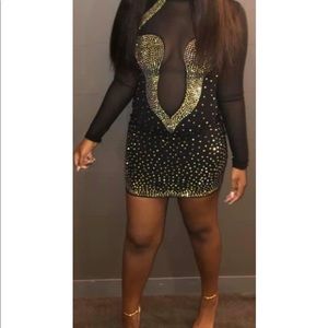Black mesh dress with gold design from poshbyv